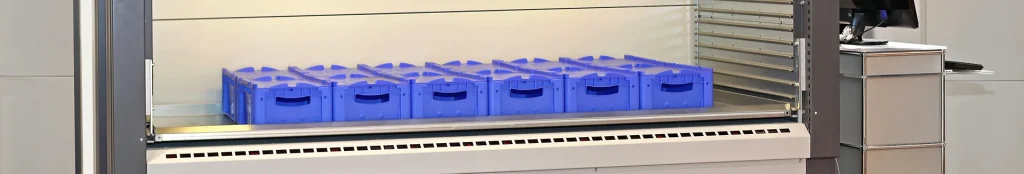 Vertical lift machine with organized pick bins